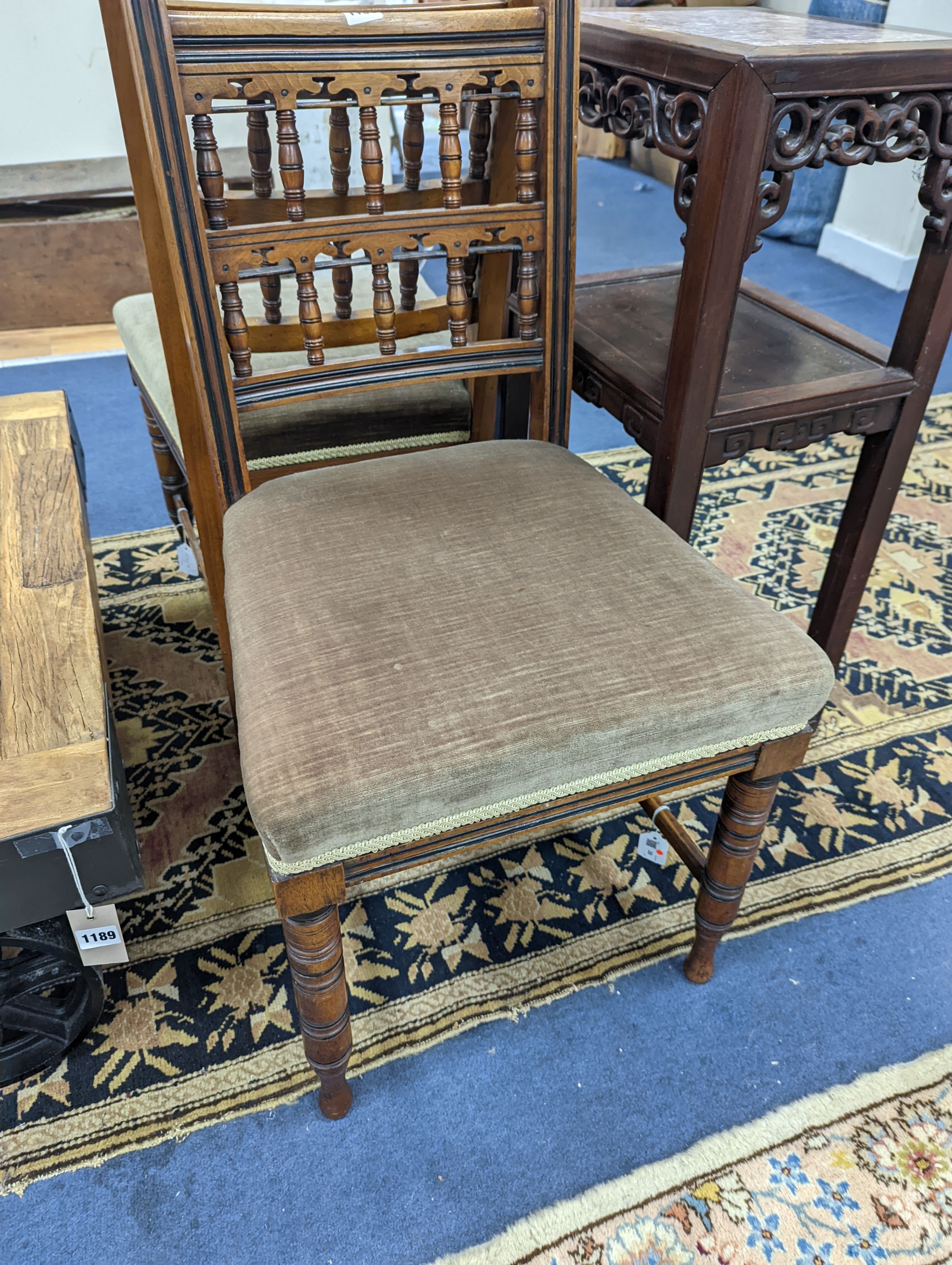 Bruce James Talbert (1838-1881) for James Lamb, Manchester, a pair of Aesthetic movement walnut side chairs, width 44cm, depth 48cm, height 82.5cm